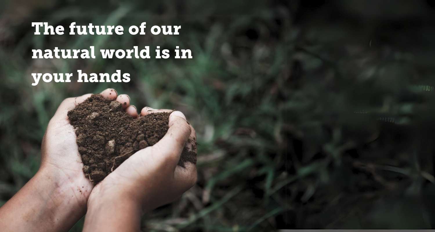 'The future of our natural world is in your hands' text layover on image of a pair of hands holding soil in the shape of a heart